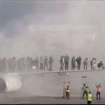 image for American Airlines plane catches fire at Denver airport