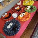 image for Just a picture of a snack table that looks like Sesame Street characters.
