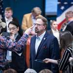 image for Veteran Sam Bingham points at Rep. Chuck Edwards, R-N.C., before a congressional town hall.