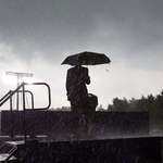 image for Obama enters a lightning storm to personally apologize for a canceled speech (May 31, 2010)