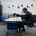 image for Obama writes his speech after he is briefed on the Sandy Hook school shooting (2012).