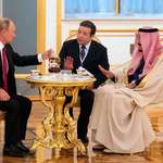 image for Putin offering his guests some tea.