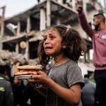 image for Girl gets food as Israel blockades all food, medicine, & fuel to 1.5 million civilians