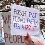 image for Protesters target Tesla showrooms in US