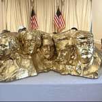 image for A Golden Mount Rushmore statue with Trump's head on it on display at Mar-A-Lago
