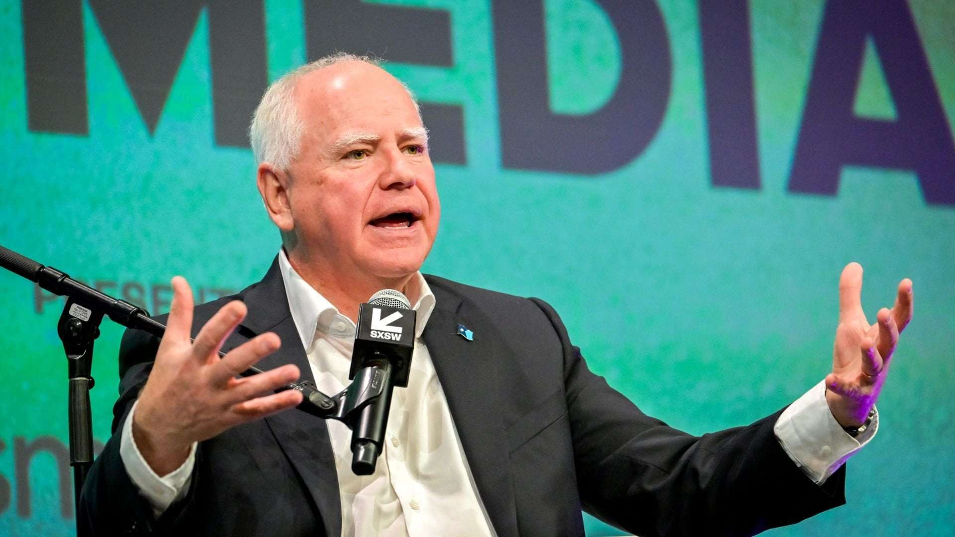 image for Tim Walz says Tesla's plunging stock price gives him a 'boost'