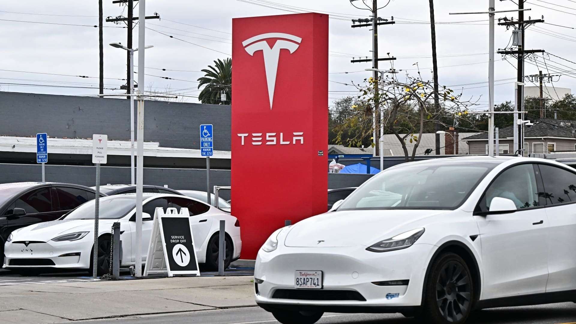 image for Tesla owners are trading in their EVs at record levels, Edmunds says