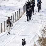 image for President of Finland (wearing goggles) inspecting ski patrol on Finnish-Russian border fence