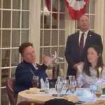 image for Elon Musk mesmerised by a knife and fork whilst attending an event with Trump