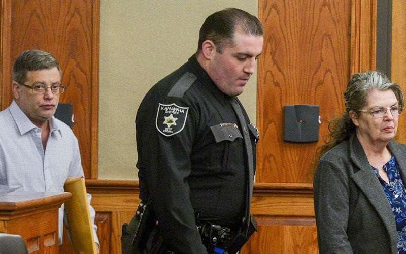 image for Couple sentenced to hundreds of years in prison for forcing adopted Black children to work as 'slaves'