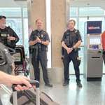 image for [oc] I will never understand why we need this level of arms out in the open at the airport.