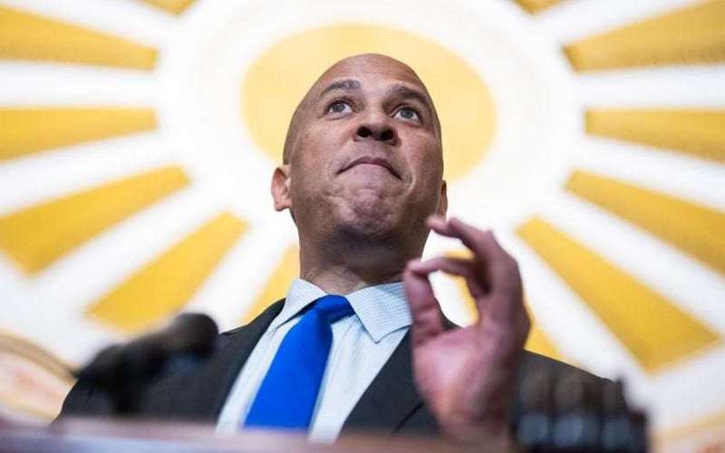 image for Cory Booker Has Been Shaming and Protesting the Trump Administration for 20 Straight Hours