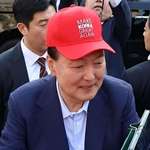 image for Impeached South Korean ex-president Yoon spotted wearing a red hat says "Make Korea Great Again"
