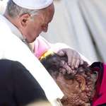 image for Pope Francis embraces Vinicio Riva, November 6, 2013