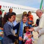 image for Pope Francis greets a group of Syrian refugees, arrived with the pontiff’s charter plane in 2016