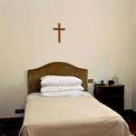 image for In the 12 years of his Papacy, Pope Francis lived in room 201 of Casa Santa Marta. This was his room