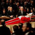 image for Three Former U.S. presidents, all dressed in black suits during the Funeral of Pope John Paul II