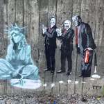 image for New street art on a wall near my house showed up two nights ago.