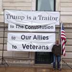 image for [OC] Iraq Vet protests in the rain. MN capital. May 1st