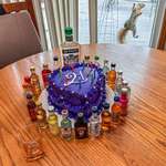 image for My youngest turned 21 today, and even the squirrels tried demanding a share of the spoils