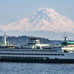 image for Washington State Ferry Tacoma sailing across Puget Sound out of Seattle below Her Majesty Tahoma