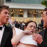 image for Emma stone getting scared by a bee on the red carpet