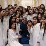 image for UAE’s Foreign Minister Sheikh Abdullah bin Zayed posing with the girls who welcomed President Trump