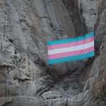 image for LGBTQ climbers hang a large transgender pride flag in the middle of Yosemite's El Capitan (OC)