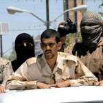 image for An Iraqi soldier is paraded through the streets of Fallujah by ISIS before being hanged 2015.