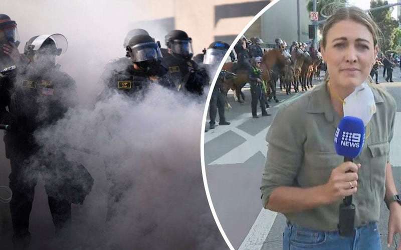 image for Los Angeles protests: Reporter hit with rubber bullet live on camera as tensions erupt