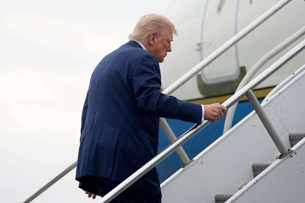 image for Trump stumbles on steps up to Air Force One