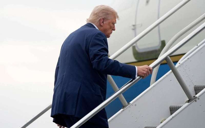 image for Trump stumbles on steps up to Air Force One