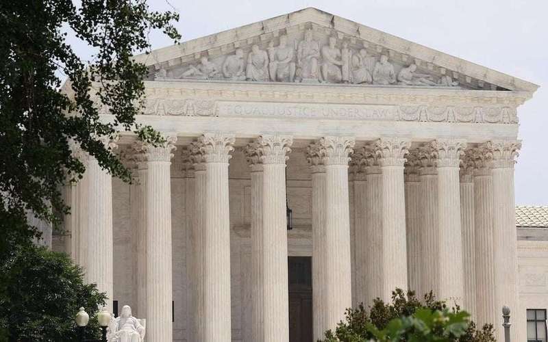 image for Supreme Court halts lower court orders requiring DOGE to hand over information about work and personnel