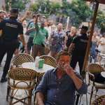 image for A tourist during an anti-tourist protest in Barcelona yesterday