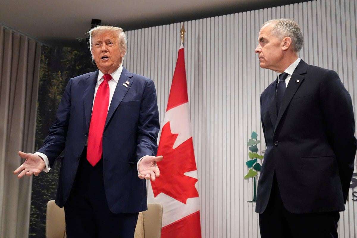 image for Trump says ‘was mistake’ to boot Putin from G7 as he trashes Trudeau with Canadian PM Carney standing beside him