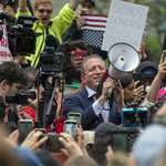 image for NYC mayoral candidate Brad Lander addresses the crowd after being released from custody.