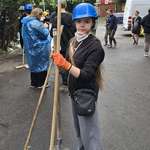 image for A strong volunteer, cleaning up after the recent airstrike in Kyiv