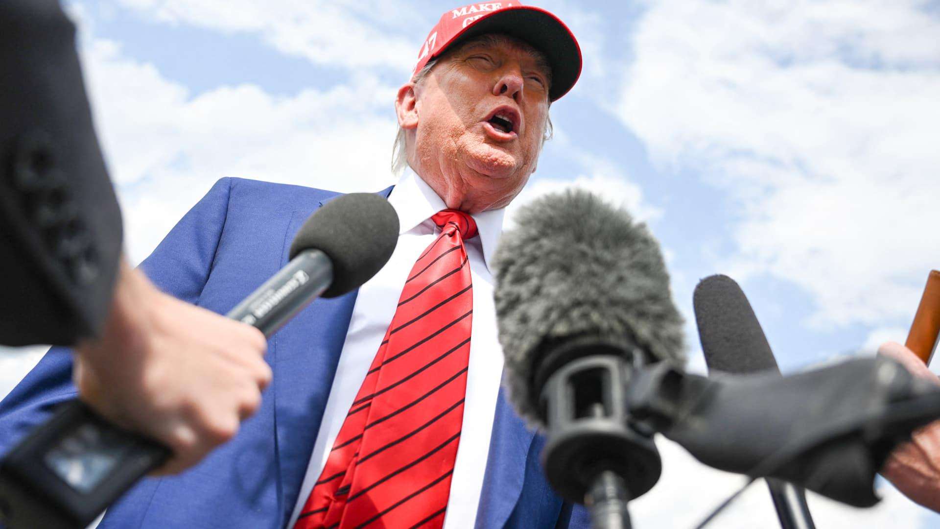 image for Trump says he's 'not happy' as Israel and Iran both claim ceasefire violations