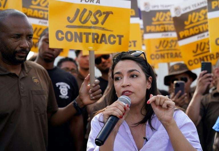 image for AOC Responds To Trump After He Calls Her 'Stupid': 'Only Took You 5 Months To Break Almost Every Promise'