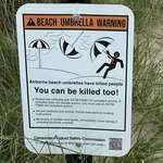 image for Summer time, so everyone be careful of flying umbrellas at the beach.