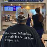 image for Oklahoma State Cowboys fan in line for a pretzel in St Louis, Missouri