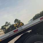 image for Saw a semi truck towing only three toy trucks on my way to work today