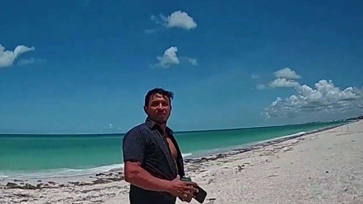 image for Man arrested, facing possible deportation days after helping save girl in shark attack