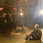 image for [OC] This brave woman sat alone in front of the entire cordon of Serbian police