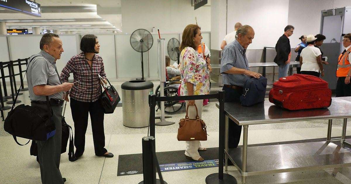 image for Passengers at some U.S. airports no longer have to remove shoes, sources say