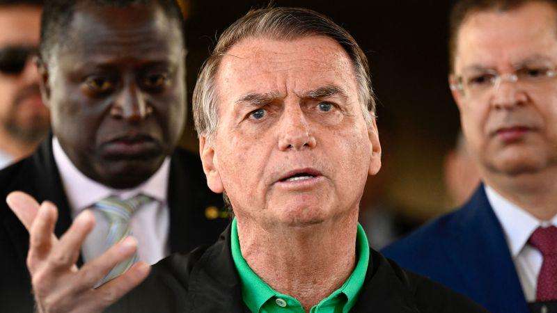image for Bolsonaro: Brazil police raid ex-President Bolsonaro’s home, fit ankle tag, citing flight risk concern amid criminal trial