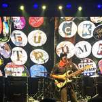 image for [OC] A photo of Tom Morello playing guitar with a "Fuck Trump" backrop, 17 July 2025