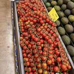 image for hang on… gotta call you back. i have to admire the tomato display at the grocery store [OC]