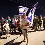 image for Israeli settlers are blocking aid trucks from entering Gaza - August 4