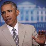 image for President Obama wears a tan suit at a press conference in 2014